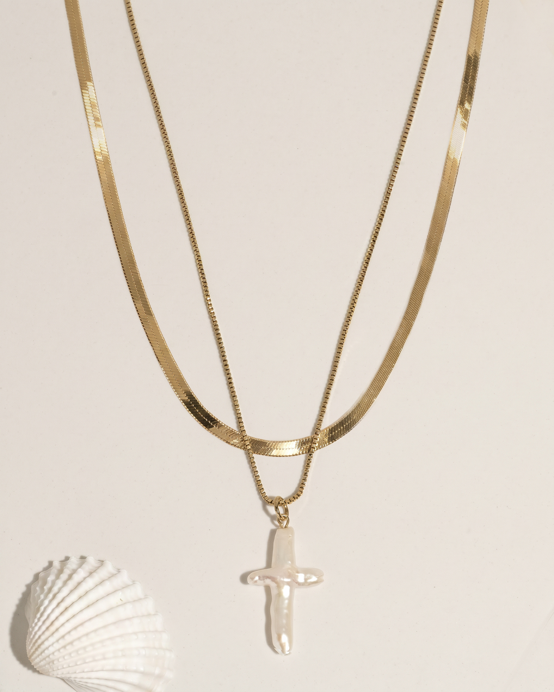 james-michelle-pearl-cross-layered-necklace-gold-pearl-main-flat-lay